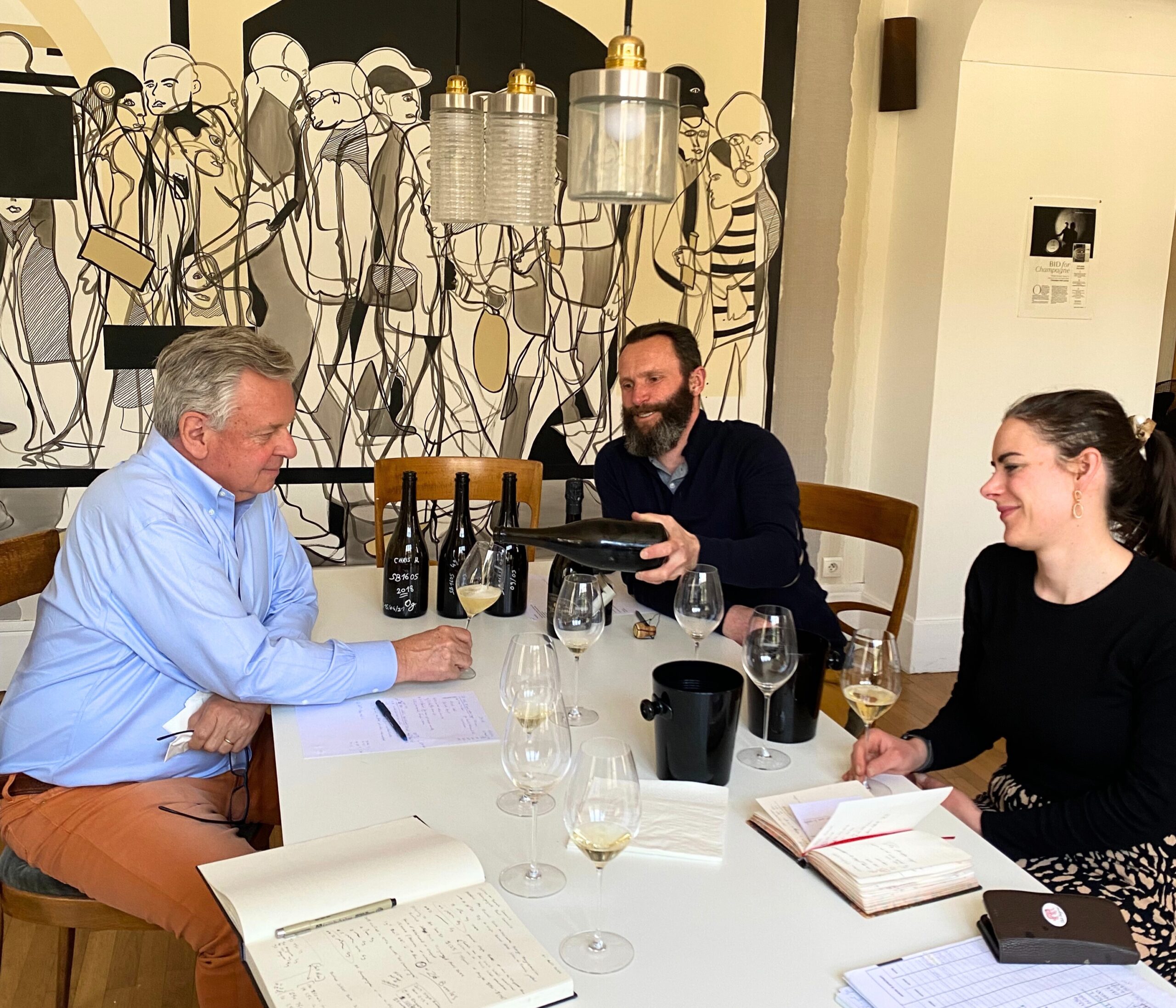 Chris Hermann and Julien Launois and Sarah Launois at work in Champagne